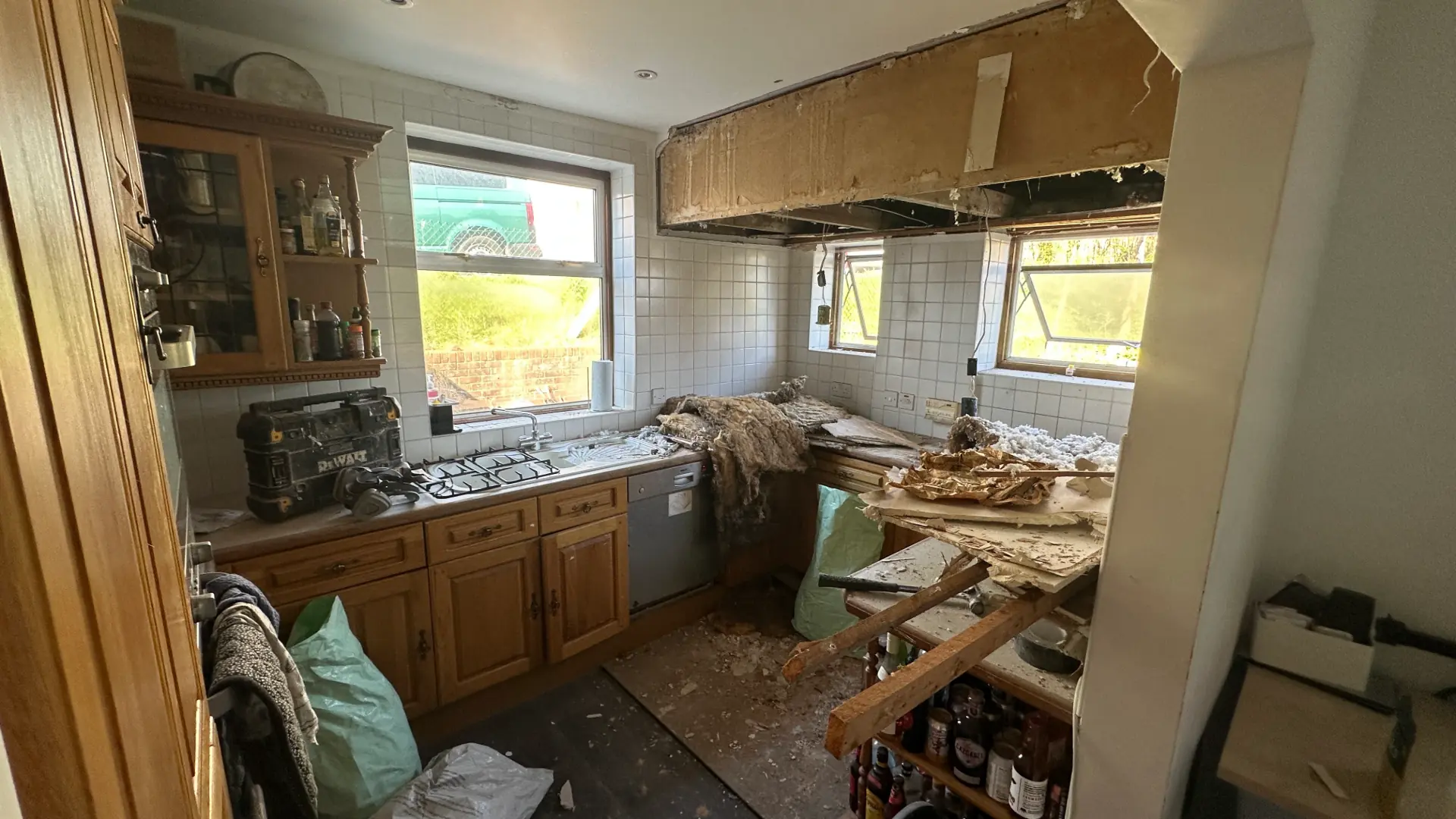 Before — old Mile Oak kitchen starting to be ripped out