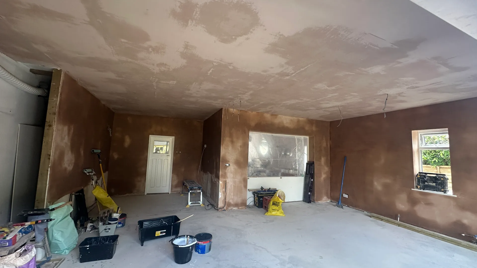 After — freshly skimmed walls and ceiling in Lancing